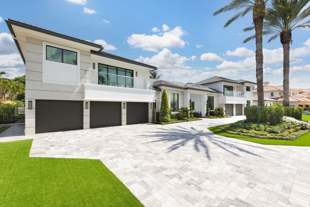 The Home in Boca Raton is a newly renovated Estate in the prestigious Royal Palm Yacht and Country Club with resort-style amenities now available for sale. This home located at 231 Thatch Palm Dr, Boca Raton, Florida