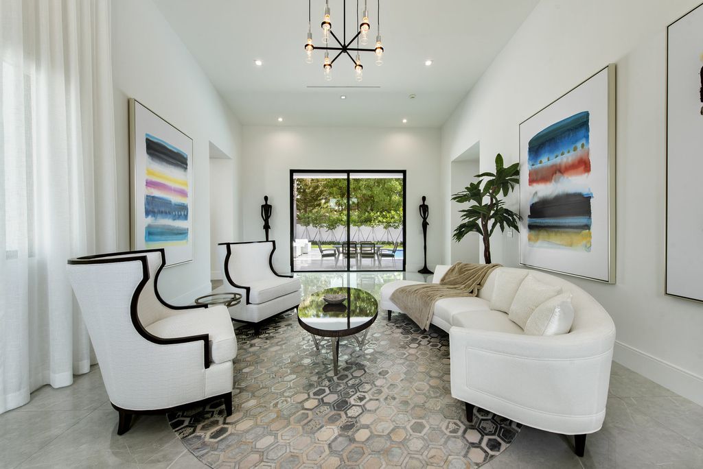 The Home in Boca Raton is a newly renovated Estate in the prestigious Royal Palm Yacht and Country Club with resort-style amenities now available for sale. This home located at 231 Thatch Palm Dr, Boca Raton, Florida