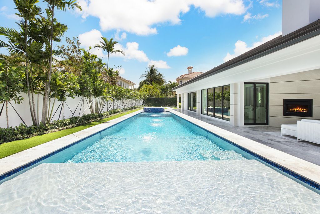 The Home in Boca Raton is a newly renovated Estate in the prestigious Royal Palm Yacht and Country Club with resort-style amenities now available for sale. This home located at 231 Thatch Palm Dr, Boca Raton, Florida