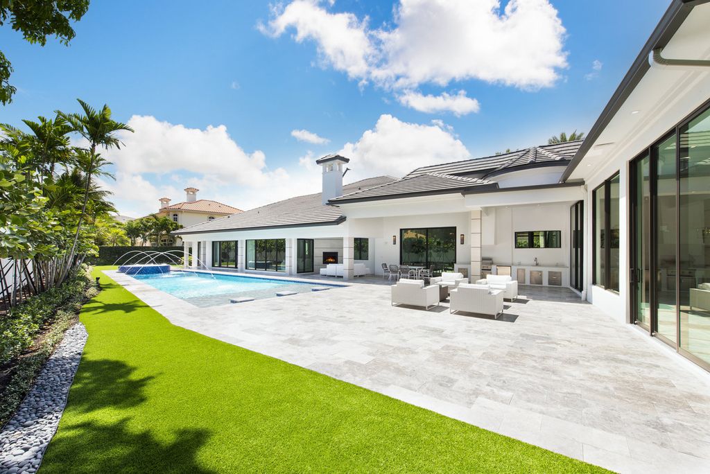 The Home in Boca Raton is a newly renovated Estate in the prestigious Royal Palm Yacht and Country Club with resort-style amenities now available for sale. This home located at 231 Thatch Palm Dr, Boca Raton, Florida