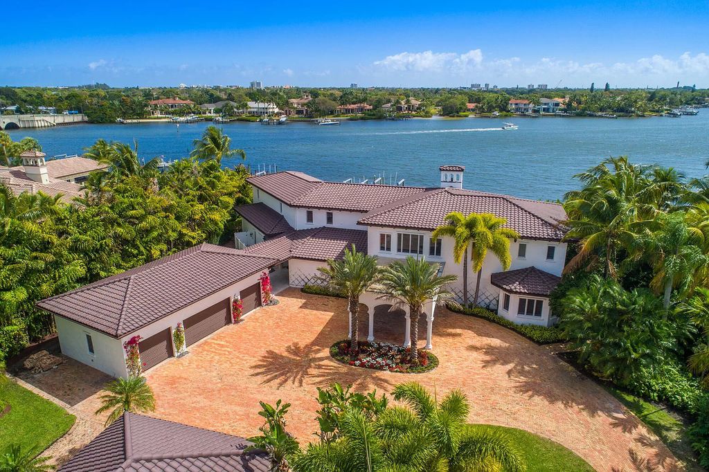 The Home in Jupiter is a newly renovated transitional custom estate with detached guest house, private tennis court and 2 gated entries for complete privacy now available for sale. This home located at 19000 Point Dr, Jupiter, Florida