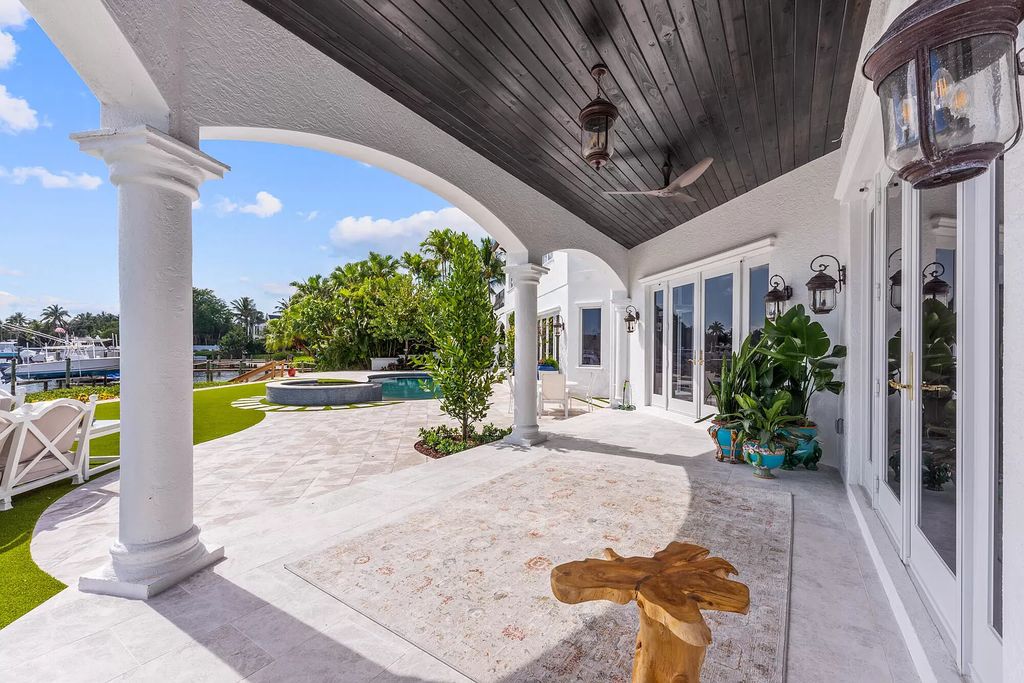 The Home in Jupiter is a newly renovated transitional custom estate with detached guest house, private tennis court and 2 gated entries for complete privacy now available for sale. This home located at 19000 Point Dr, Jupiter, Florida