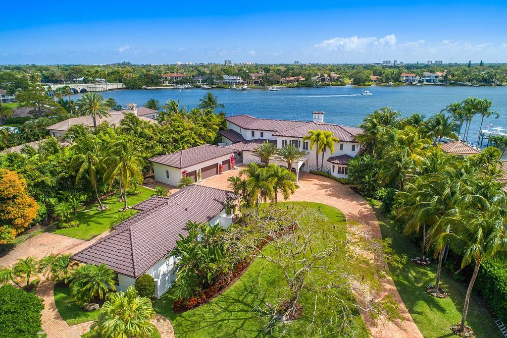 The Home in Jupiter is a newly renovated transitional custom estate with detached guest house, private tennis court and 2 gated entries for complete privacy now available for sale. This home located at 19000 Point Dr, Jupiter, Florida