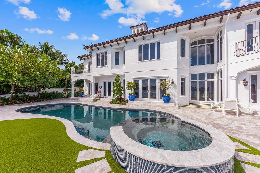 The Home in Jupiter is a newly renovated transitional custom estate with detached guest house, private tennis court and 2 gated entries for complete privacy now available for sale. This home located at 19000 Point Dr, Jupiter, Florida