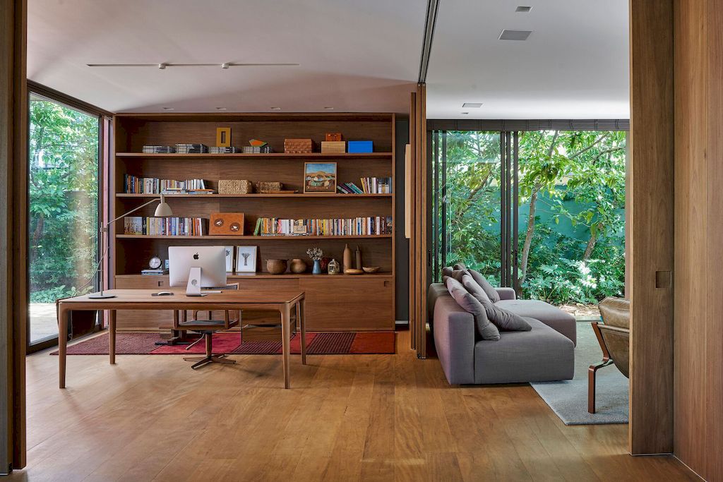 Passos House with Open Concept and Integrated Spaces by David Guerra