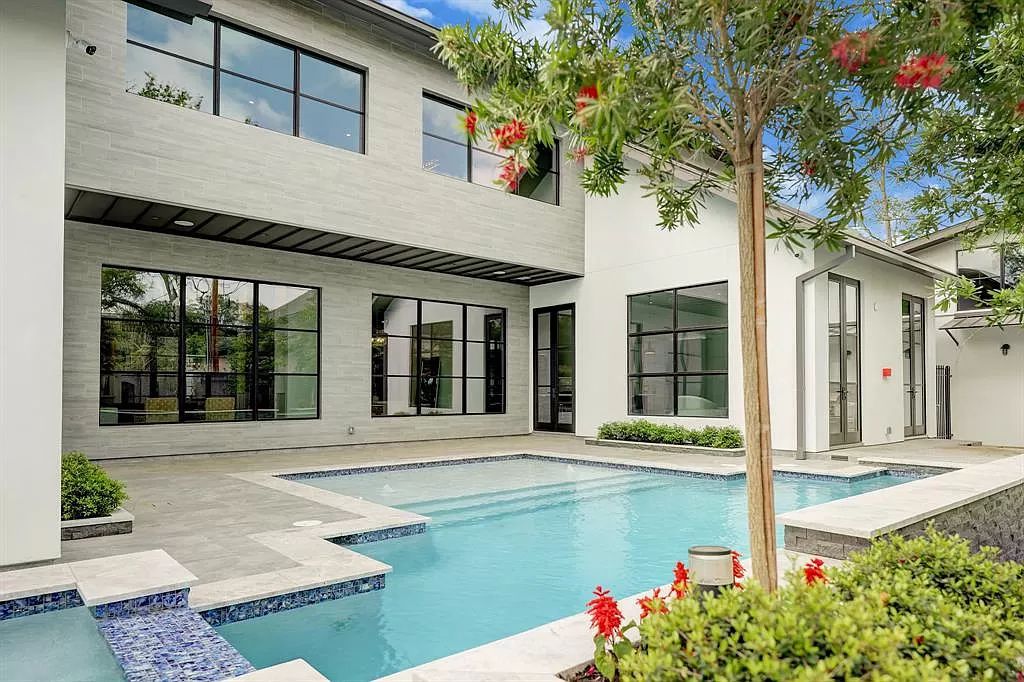 The Home in Houston is a sophisticated contemporary estate on cul de sac in Bunker Hill with smart amenities now available for sale. This home located at 11710 Fidelia Ct, Houston, Texas