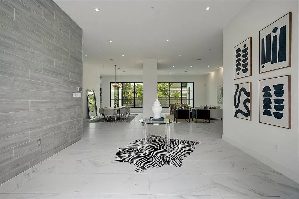 The Home in Houston is a sophisticated contemporary estate on cul de sac in Bunker Hill with smart amenities now available for sale. This home located at 11710 Fidelia Ct, Houston, Texas