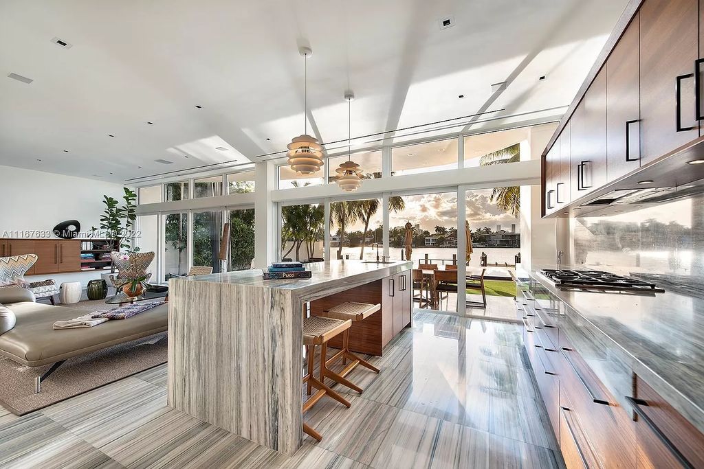 The Miami Beach Home is a stunning tropical modern estate with wide open west bay views now available for rent. This house located at 610 W Dilido Dr, Miami Beach, Florida