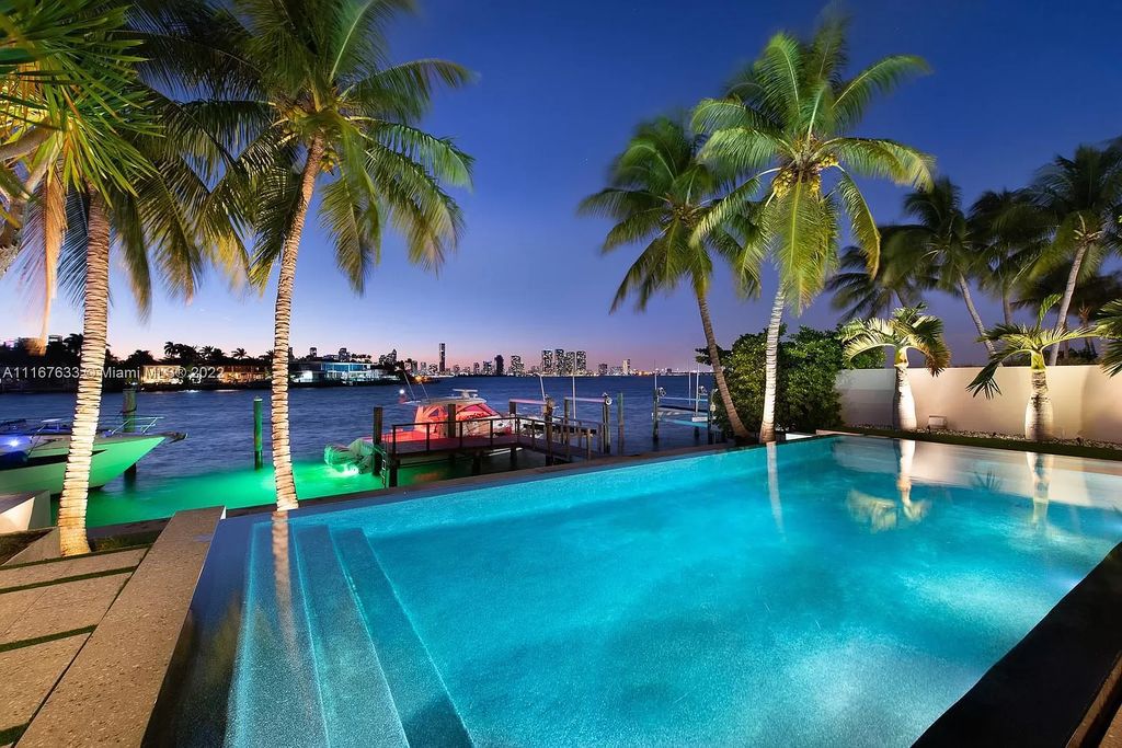 The Miami Beach Home is a stunning tropical modern estate with wide open west bay views now available for rent. This house located at 610 W Dilido Dr, Miami Beach, Florida