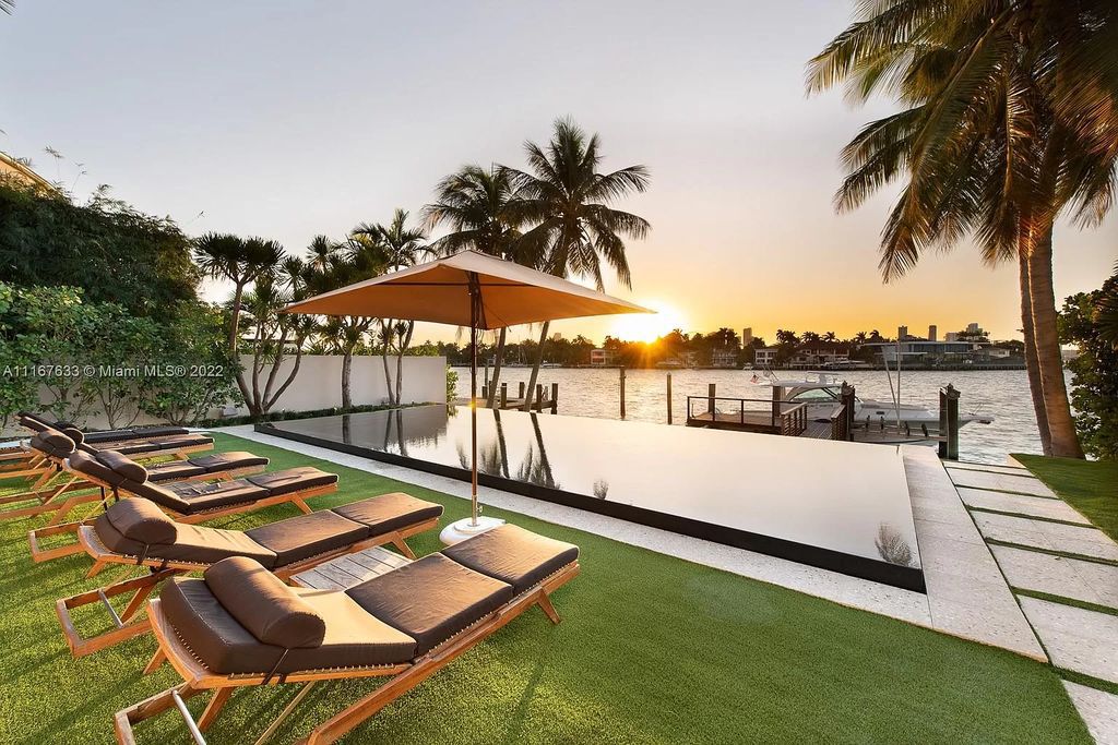 The Miami Beach Home is a stunning tropical modern estate with wide open west bay views now available for rent. This house located at 610 W Dilido Dr, Miami Beach, Florida