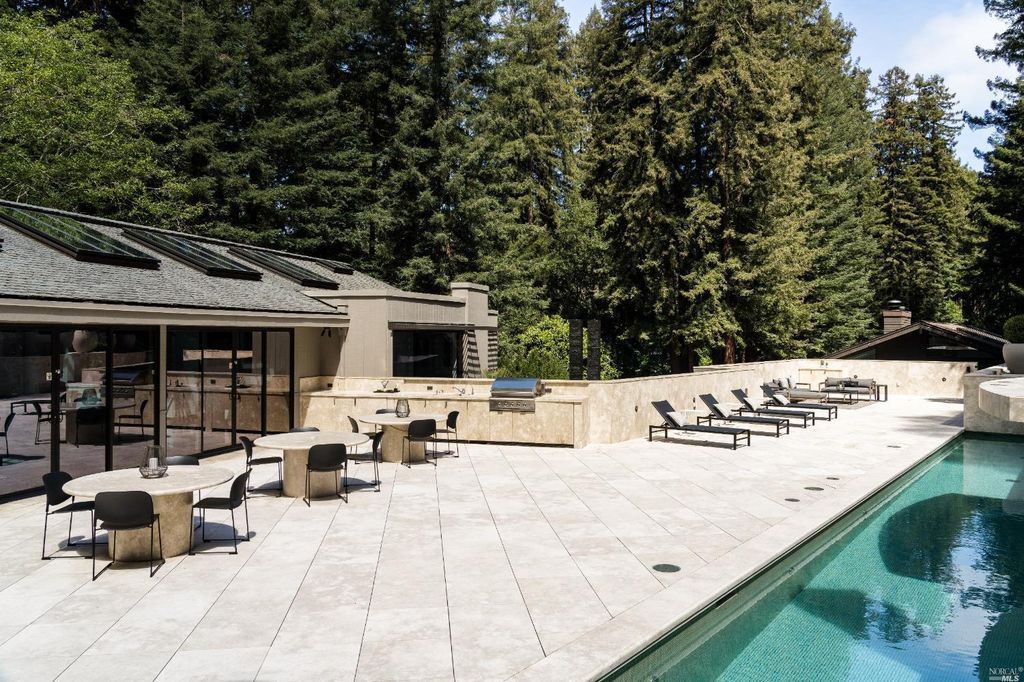 The Estate in Mill Valley is a sunny, flat property has a private gated driveway, resort style entertaining with lap pool now available for sale. This home located at 7-11 Ethel Ct, Mill Valley, California