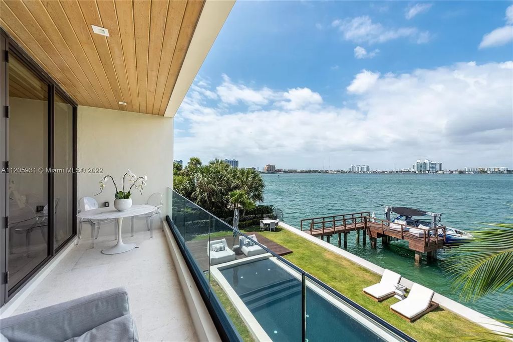 The Home in Miami Beach is a modern waterfront with a western exposure capturing unobstructed water views and dramatic sunsets over Biscayne Bay now available for sale. This home located at 2608 Biarritz Dr, Miami Beach, Florida