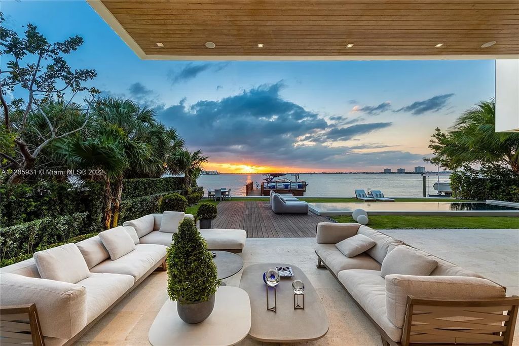 The Home in Miami Beach is a modern waterfront with a western exposure capturing unobstructed water views and dramatic sunsets over Biscayne Bay now available for sale. This home located at 2608 Biarritz Dr, Miami Beach, Florida