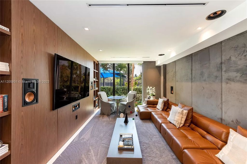 The Home in Miami Beach is a modern waterfront with a western exposure capturing unobstructed water views and dramatic sunsets over Biscayne Bay now available for sale. This home located at 2608 Biarritz Dr, Miami Beach, Florida