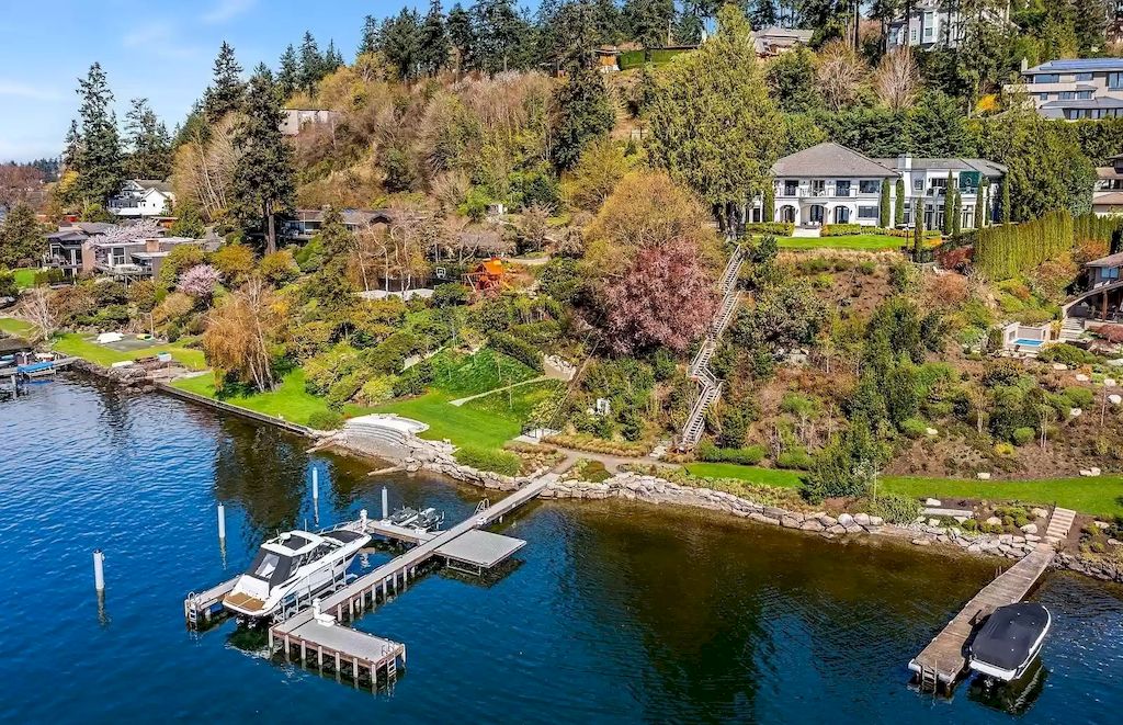 The Estate in Washington is a luxurious home offering elevated living, exquisite design and exceptional views now available for sale. This home located at 905 Shoreland Drive SE, Bellevue, Washington; offering 06 bedrooms and 07 bathrooms with 11,104 square feet of living spaces.
