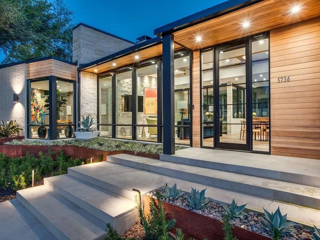 The Home in Dallas is a modern masterpiece features high-end luxury design and custom details including custom dry stacked stone, custom metal gutters, metal roof now available for sale. This home located at 5736 Stonegate Rd, Dallas, Texas