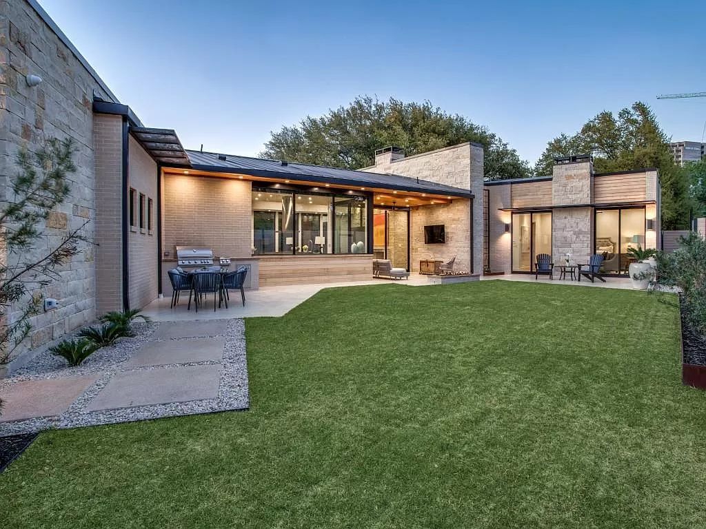 The Home in Dallas is a modern masterpiece features high-end luxury design and custom details including custom dry stacked stone, custom metal gutters, metal roof now available for sale. This home located at 5736 Stonegate Rd, Dallas, Texas