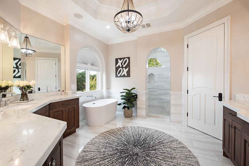 The Naples Home offers a perfect union between classically elegant architecture and contemporary finishes now available for sale. This home located at 13124 White Violet Dr, Naples, Florida