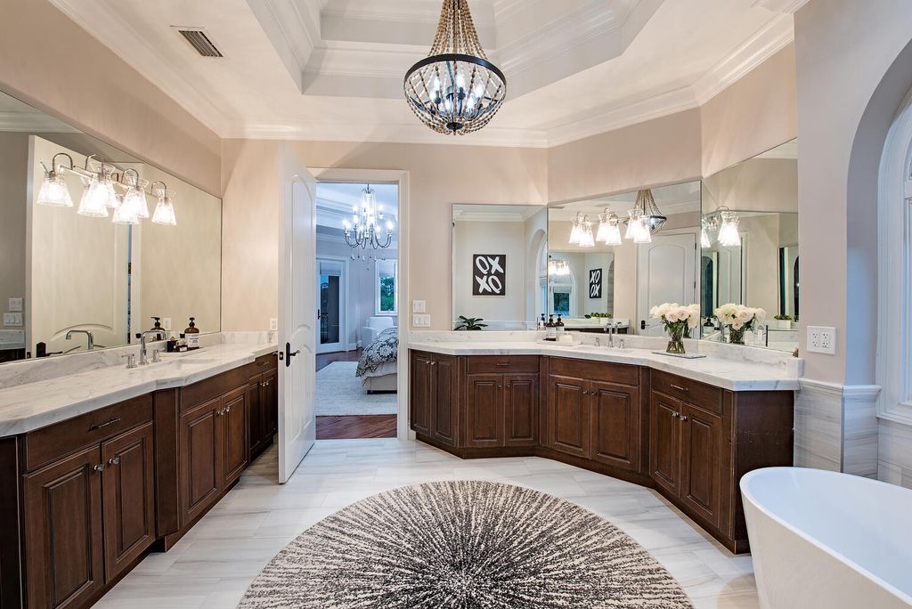 The Naples Home offers a perfect union between classically elegant architecture and contemporary finishes now available for sale. This home located at 13124 White Violet Dr, Naples, Florida