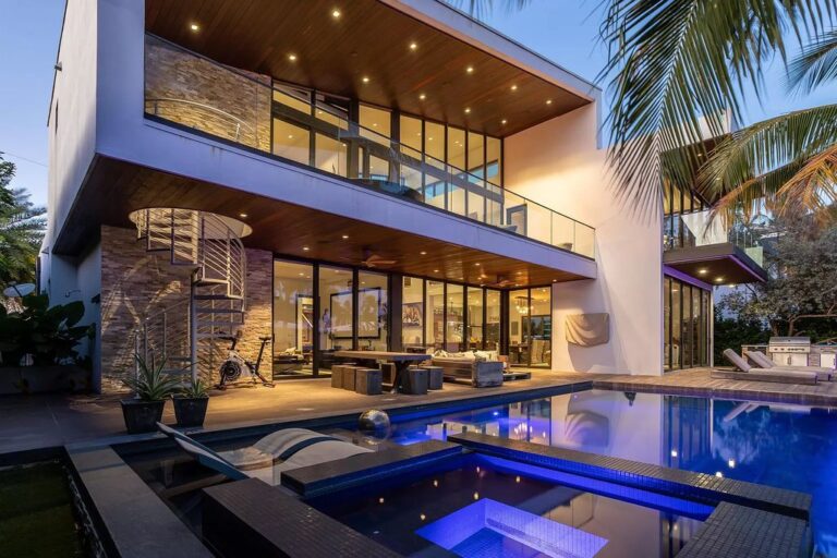 This $6,195,000 Contemporary Waterfront Home in Boca Raton has A Dramatic Two Story Great Room