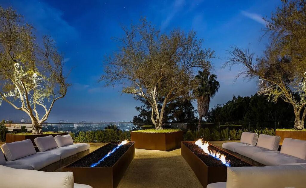 The Bel Air Mansion is a recently completed 15,000 sf contemporary masterpiece with soaring ceilings throughout, state-of-the-art amenities now available for sale. This home located at 755 Sarbonne Rd, Los Angeles, California