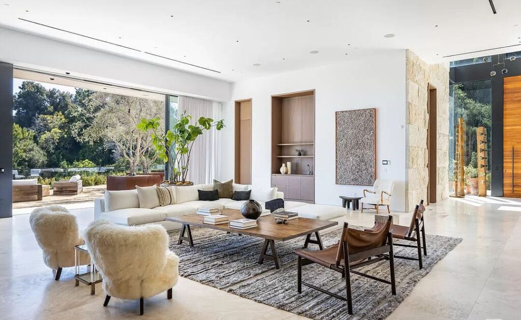 The Bel Air Mansion is a recently completed 15,000 sf contemporary masterpiece with soaring ceilings throughout, state-of-the-art amenities now available for sale. This home located at 755 Sarbonne Rd, Los Angeles, California