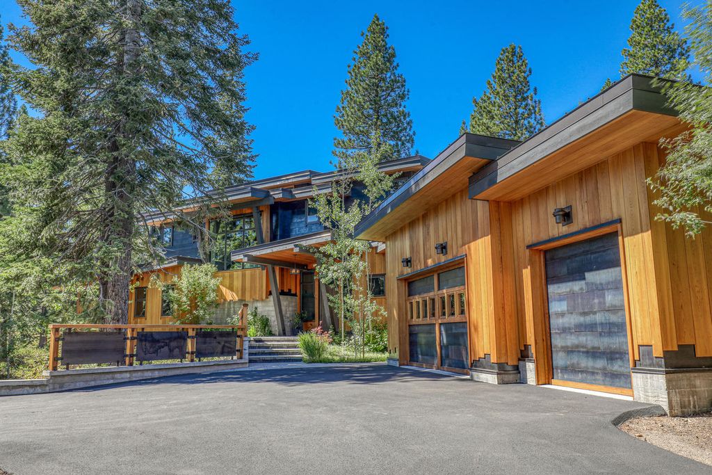 The Home in Truckee is a stunning contemporary residence with Soaring light-filled windows, peaceful greens, warm red cedar, and clean cool rolled steel now available for sale. This home located at 8440 Valhalla Dr, Truckee, California