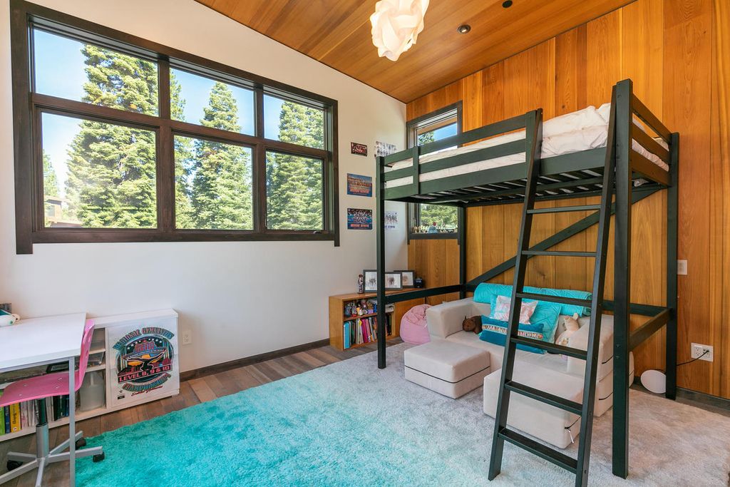 The Home in Truckee is a stunning contemporary residence with Soaring light-filled windows, peaceful greens, warm red cedar, and clean cool rolled steel now available for sale. This home located at 8440 Valhalla Dr, Truckee, California