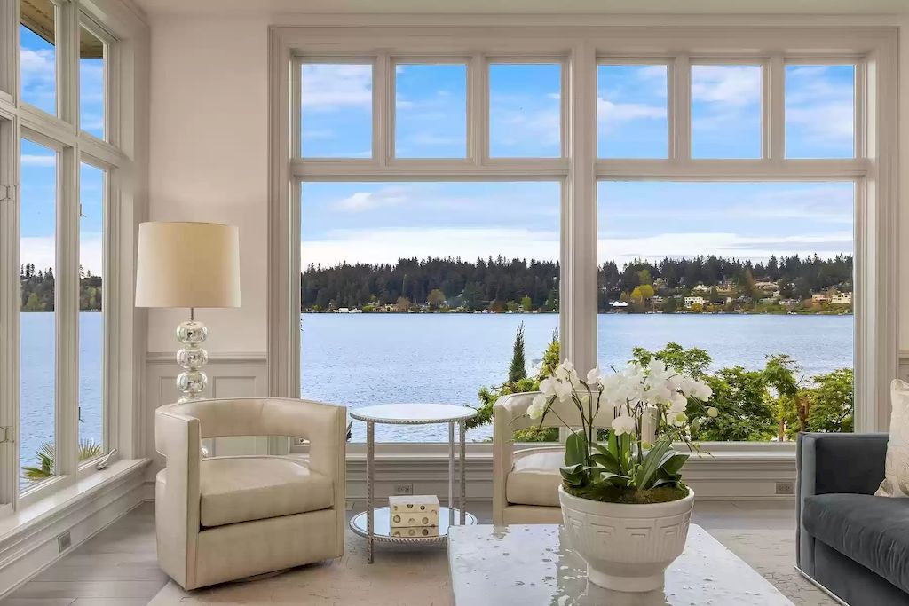 The Estate in Washington is a luxurious home highly curated landscape with an easy effort to the lake now available for sale. This home located at 8900 N Mercer Way, Mercer Island, Washington; offering 04 bedrooms and 05 bathrooms with 5,953 square feet of living spaces. 