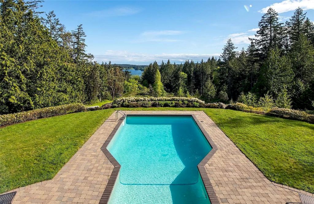 The Residence in Victoria is gated & fenced sanctuary offers the distinction & privacy that you deserve, now available for sale. This home located at 5671 Batu Rd, Victoria, BC V8Z 6K5, Canada