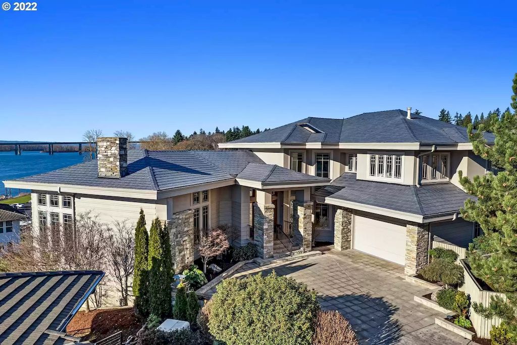 The Estate in Washington is a luxurious home sit on a perfect position to capture the sweeping views of the Columbia River now available for sale. This home located at 3700 SE 140th Ct, Vancouver, Washington; offering 04 bedrooms and 05 bathrooms with 6,678 square feet of living spaces. 