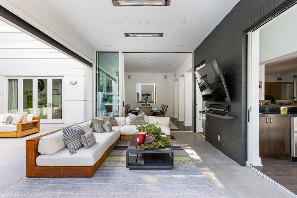 The Beverly Hills Home is an award winning Architect Trevor Abramson designed contemporary house has been impeccably maintained now available for sale. This home located at 14159 Beresford Rd, Beverly Hills, California