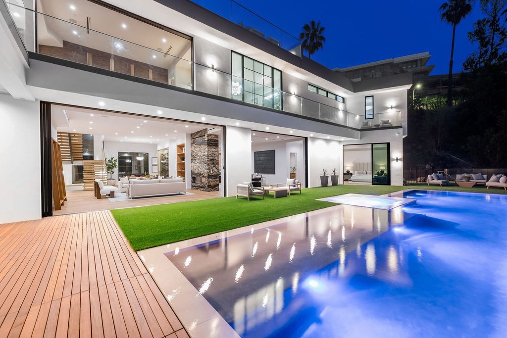 The Home in Beverly Hills is a newly constructed warm California contemporary high performance living experience now available for sale. This home located at 1635 Ferrari Dr, Beverly Hills, California