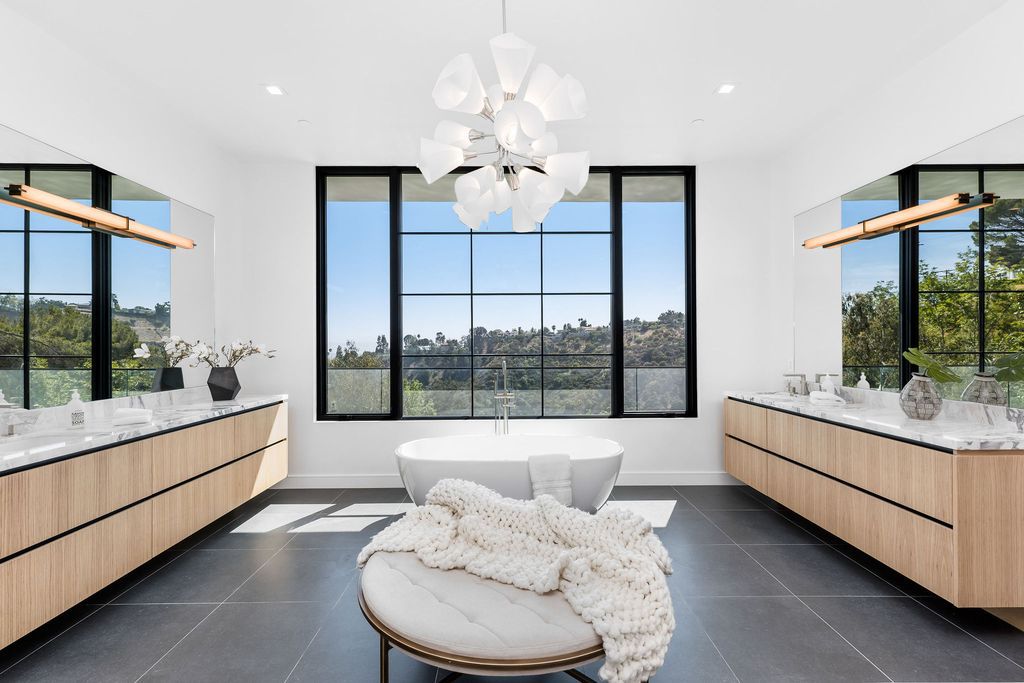 The Home in Beverly Hills is a newly constructed warm California contemporary high performance living experience now available for sale. This home located at 1635 Ferrari Dr, Beverly Hills, California