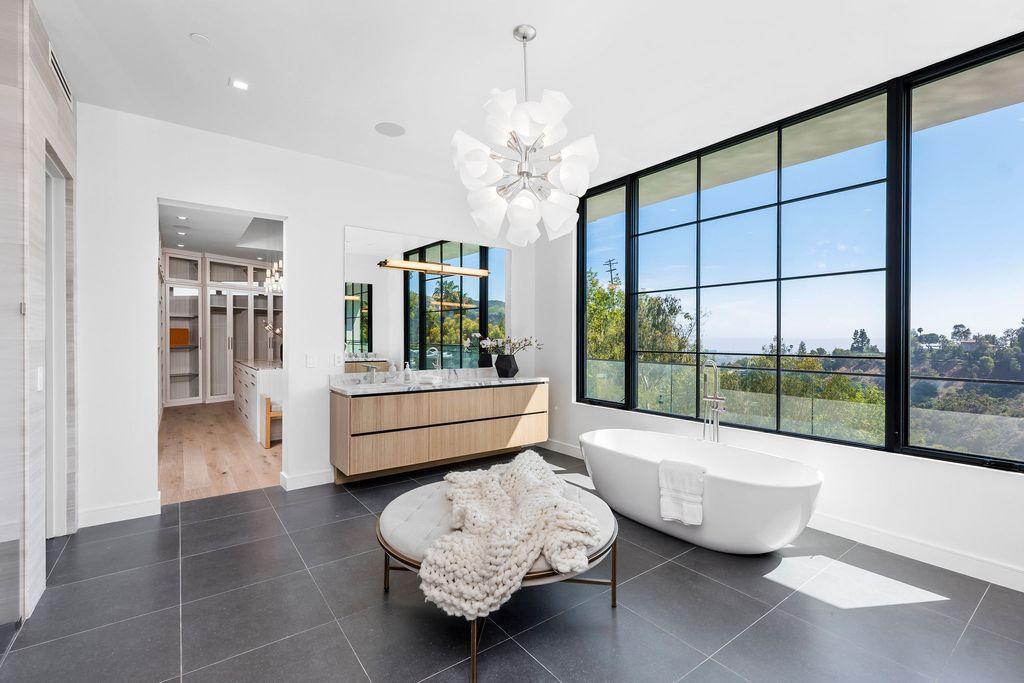 The Home in Beverly Hills is a newly constructed warm California contemporary high performance living experience now available for sale. This home located at 1635 Ferrari Dr, Beverly Hills, California