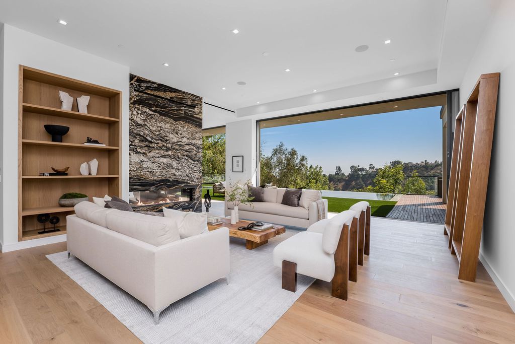 The Home in Beverly Hills is a newly constructed warm California contemporary high performance living experience now available for sale. This home located at 1635 Ferrari Dr, Beverly Hills, California