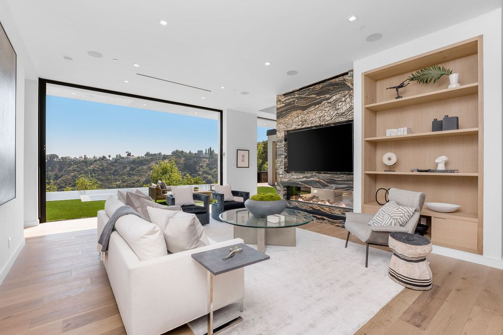 The Home in Beverly Hills is a newly constructed warm California contemporary high performance living experience now available for sale. This home located at 1635 Ferrari Dr, Beverly Hills, California