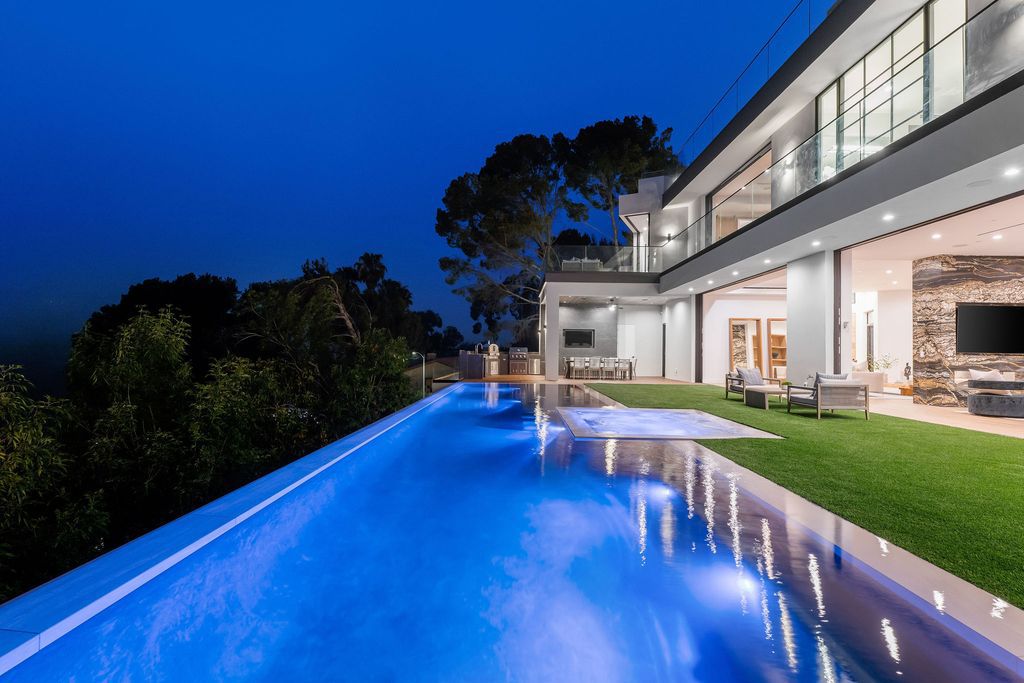 The Home in Beverly Hills is a newly constructed warm California contemporary high performance living experience now available for sale. This home located at 1635 Ferrari Dr, Beverly Hills, California