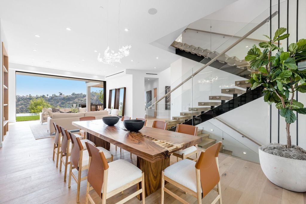 The Home in Beverly Hills is a newly constructed warm California contemporary high performance living experience now available for sale. This home located at 1635 Ferrari Dr, Beverly Hills, California