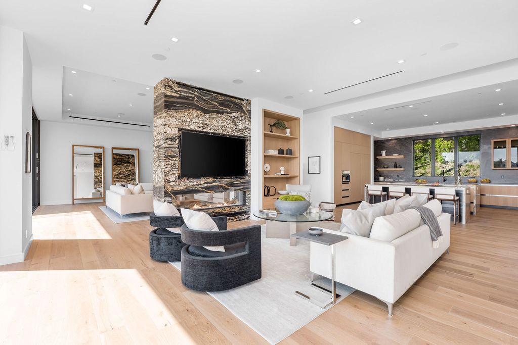 The Home in Beverly Hills is a newly constructed warm California contemporary high performance living experience now available for sale. This home located at 1635 Ferrari Dr, Beverly Hills, California