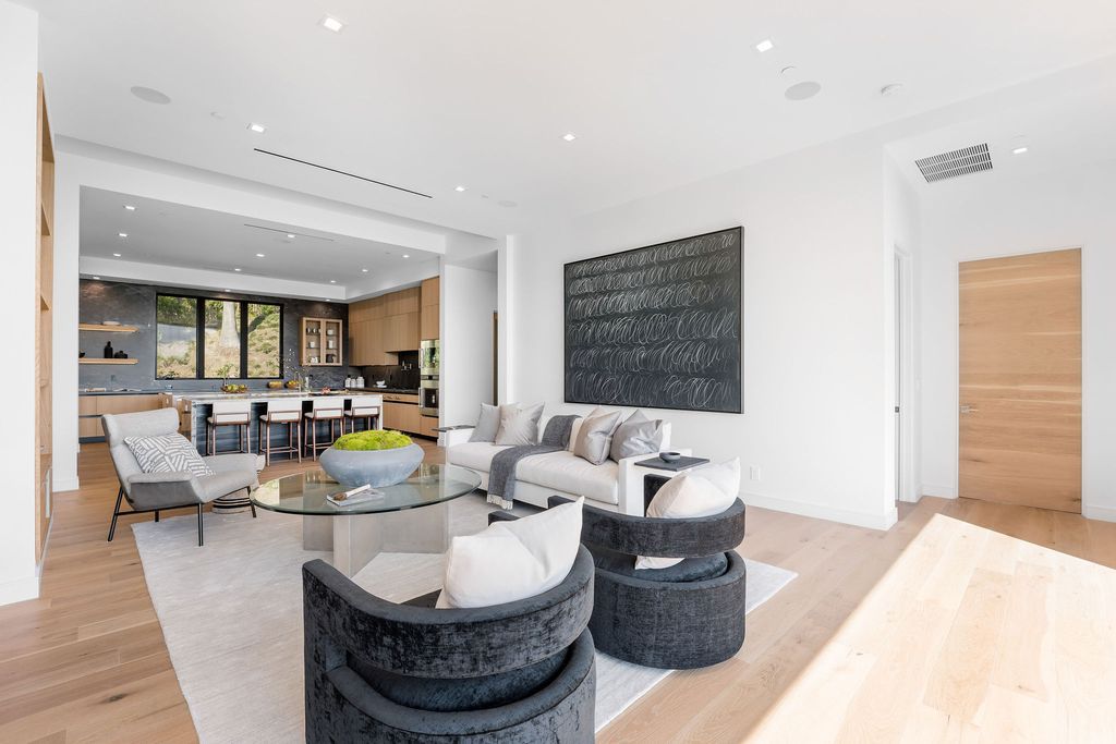 The Home in Beverly Hills is a newly constructed warm California contemporary high performance living experience now available for sale. This home located at 1635 Ferrari Dr, Beverly Hills, California