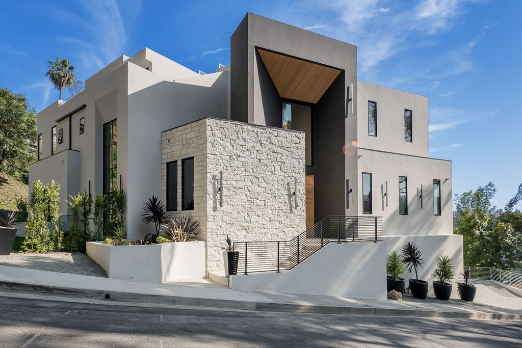 The Home in Beverly Hills is a newly constructed warm California contemporary high performance living experience now available for sale. This home located at 1635 Ferrari Dr, Beverly Hills, California