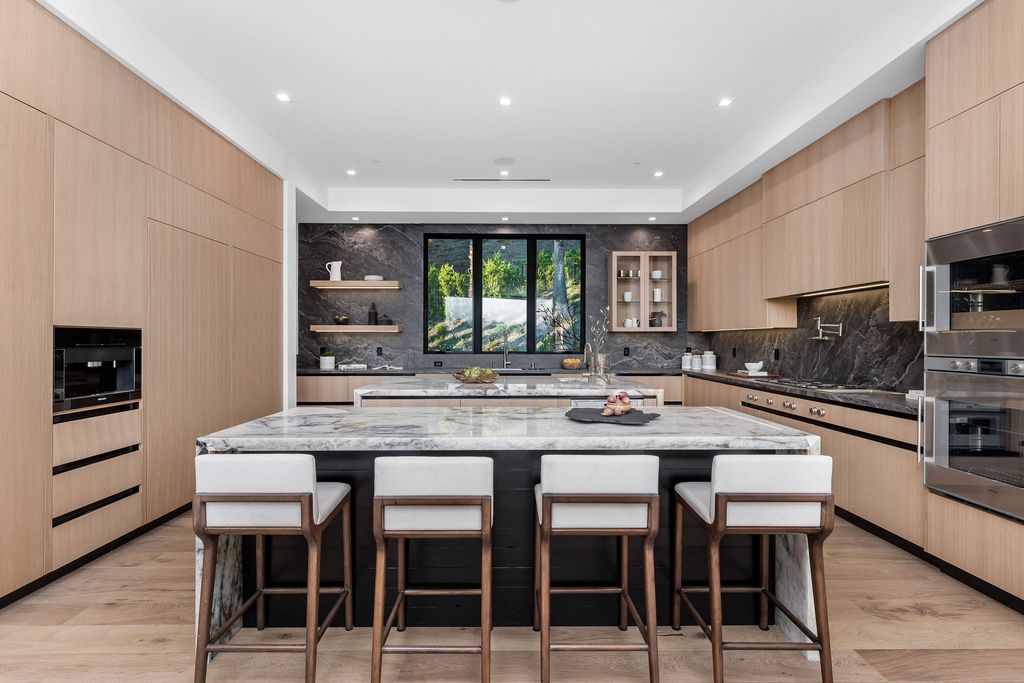 The Home in Beverly Hills is a newly constructed warm California contemporary high performance living experience now available for sale. This home located at 1635 Ferrari Dr, Beverly Hills, California