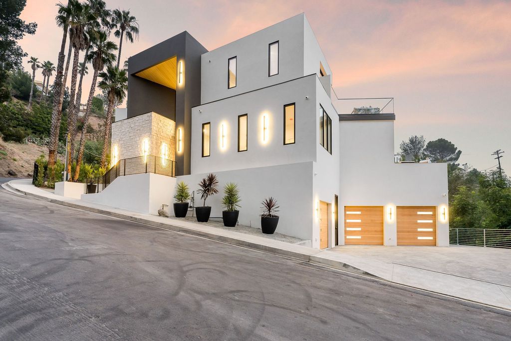 The Home in Beverly Hills is a newly constructed warm California contemporary high performance living experience now available for sale. This home located at 1635 Ferrari Dr, Beverly Hills, California