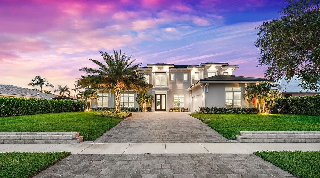 The Palm Beach Gardens Home is a newer custom built luxurious residence with high end finishes throughout now available for sale. This house located at 2169 Driftwood Cir, Palm Beach Gardens, Florida