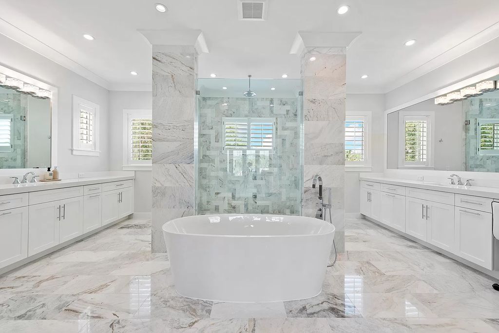 The Palm Beach Gardens Home is a newer custom built luxurious residence with high end finishes throughout now available for sale. This house located at 2169 Driftwood Cir, Palm Beach Gardens, Florida