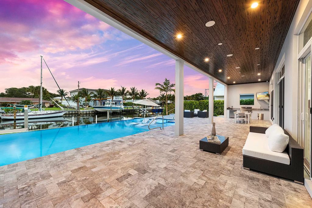 The Palm Beach Gardens Home is a newer custom built luxurious residence with high end finishes throughout now available for sale. This house located at 2169 Driftwood Cir, Palm Beach Gardens, Florida