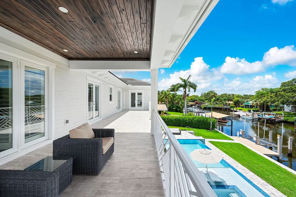 The Palm Beach Gardens Home is a newer custom built luxurious residence with high end finishes throughout now available for sale. This house located at 2169 Driftwood Cir, Palm Beach Gardens, Florida