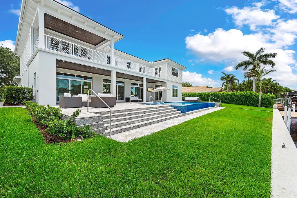 The Palm Beach Gardens Home is a newer custom built luxurious residence with high end finishes throughout now available for sale. This house located at 2169 Driftwood Cir, Palm Beach Gardens, Florida