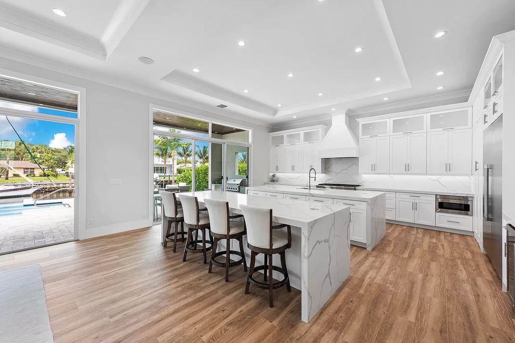 The Palm Beach Gardens Home is a newer custom built luxurious residence with high end finishes throughout now available for sale. This house located at 2169 Driftwood Cir, Palm Beach Gardens, Florida